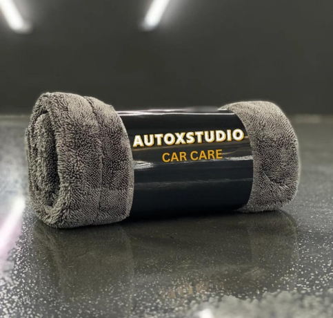 a roll of grey fleece fabric